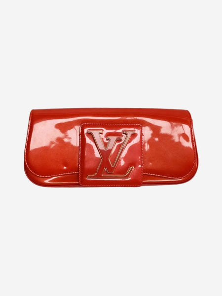 Red Sobe patent clutch product image
