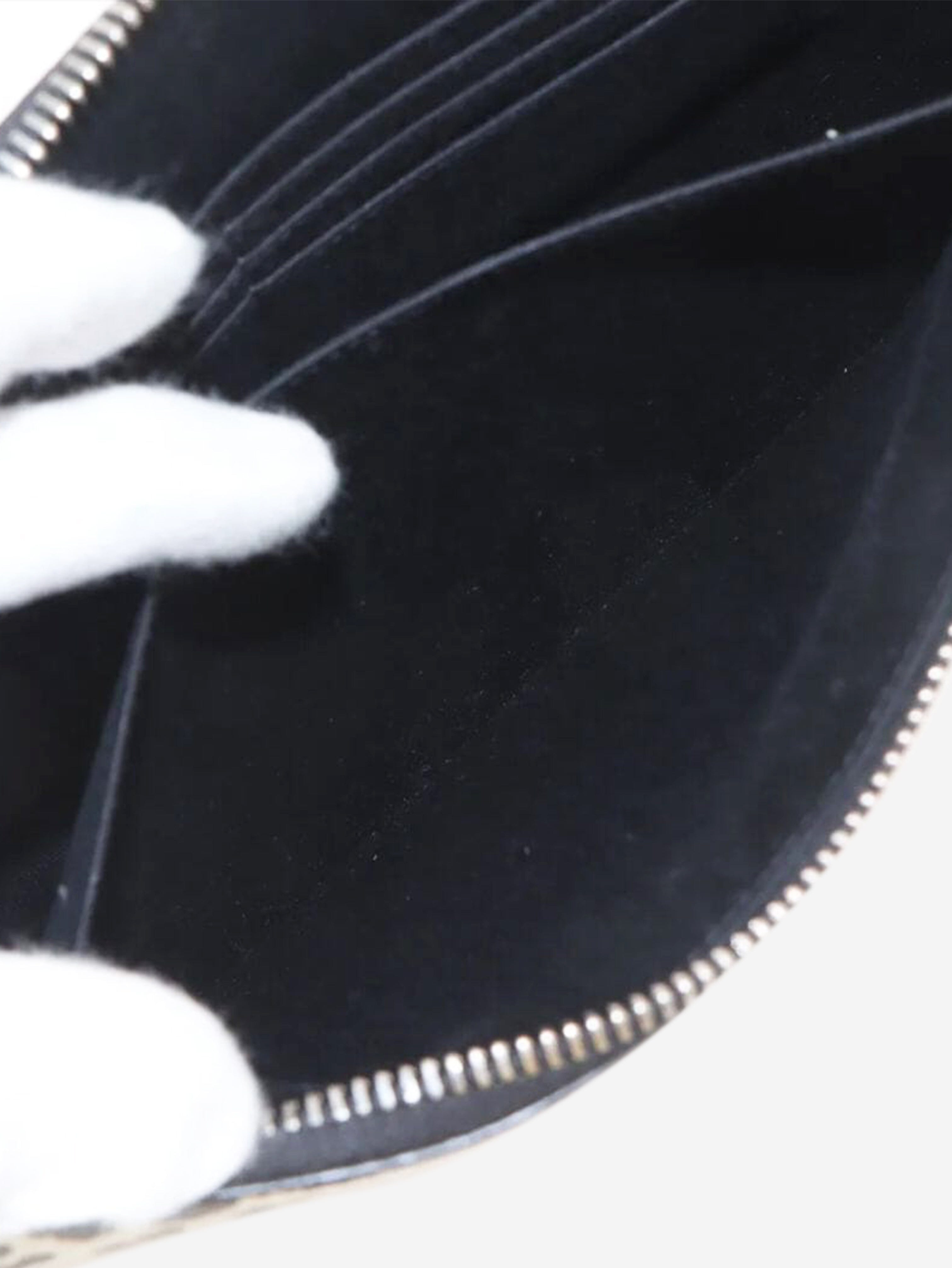 White and black leopard print leather clutch Clutch bags Saint Laurent 