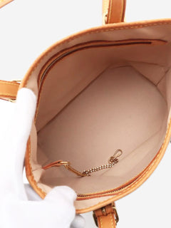 Brown vintage 2001 Monogram Bucket PM bag