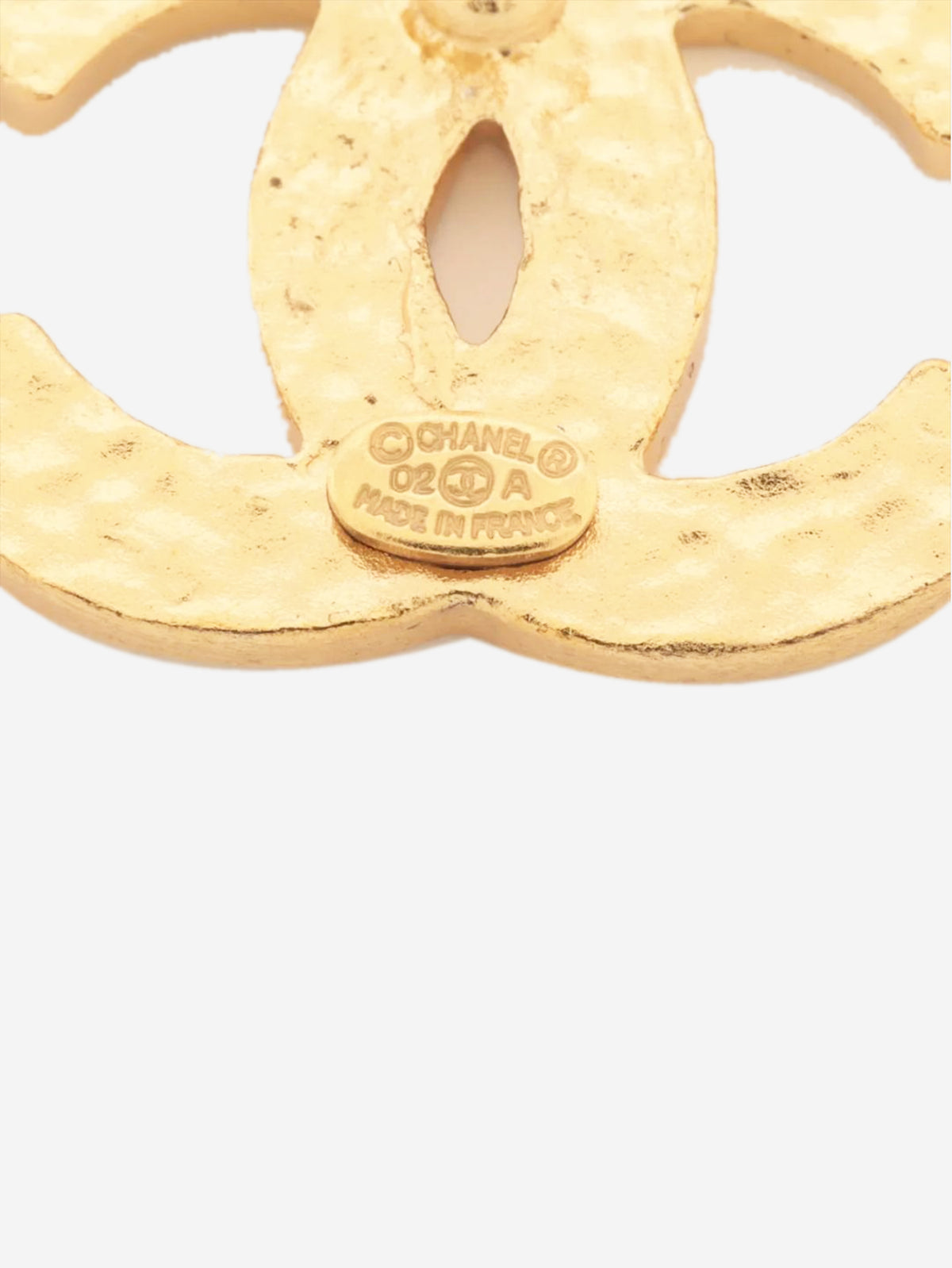 Black and gold Coco Mark 02A pin badge