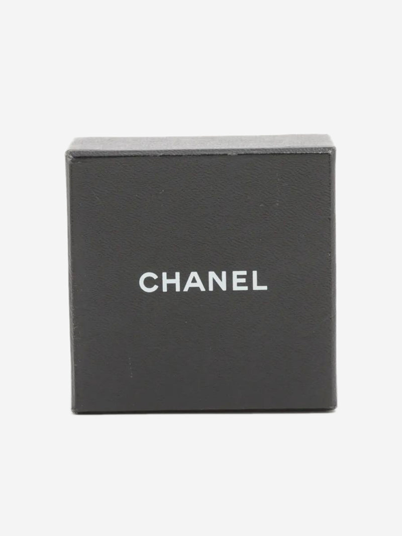 Black and gold Coco Mark 02A pin badge