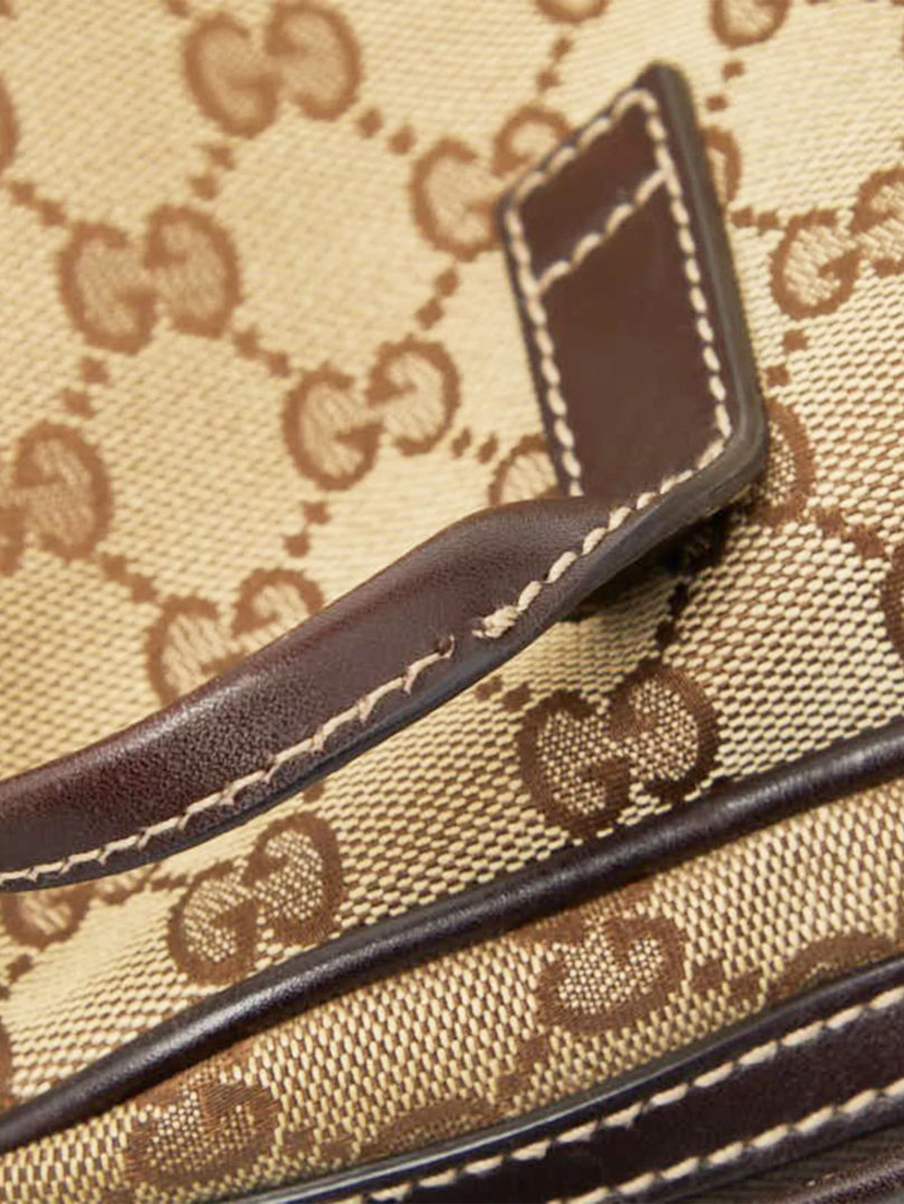 Brown GG canvas top handle bag Top Handle Bags Gucci 