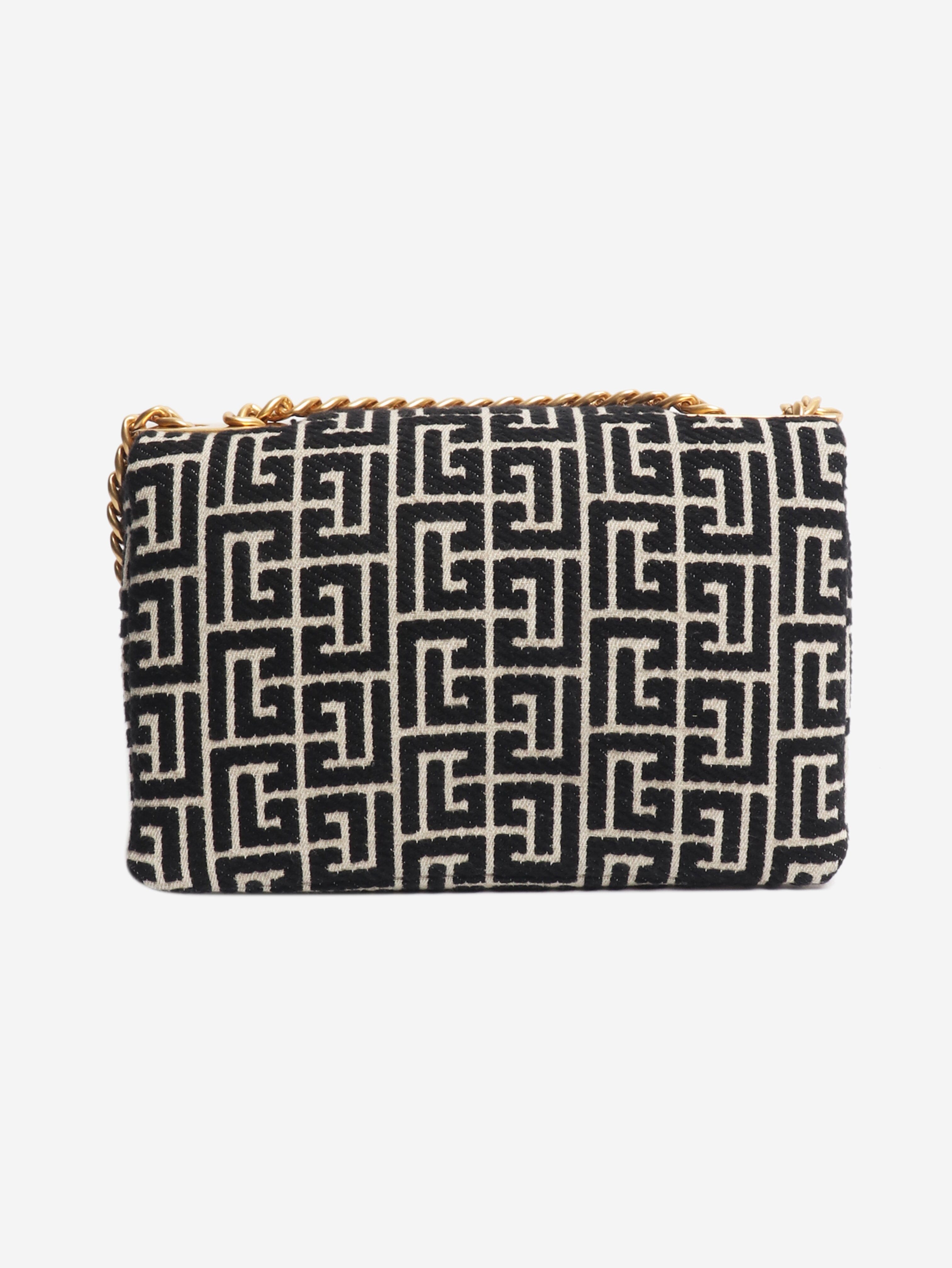 Black and neutral 1945 Soft Monogram Flap bag Shoulder bags Balmain 