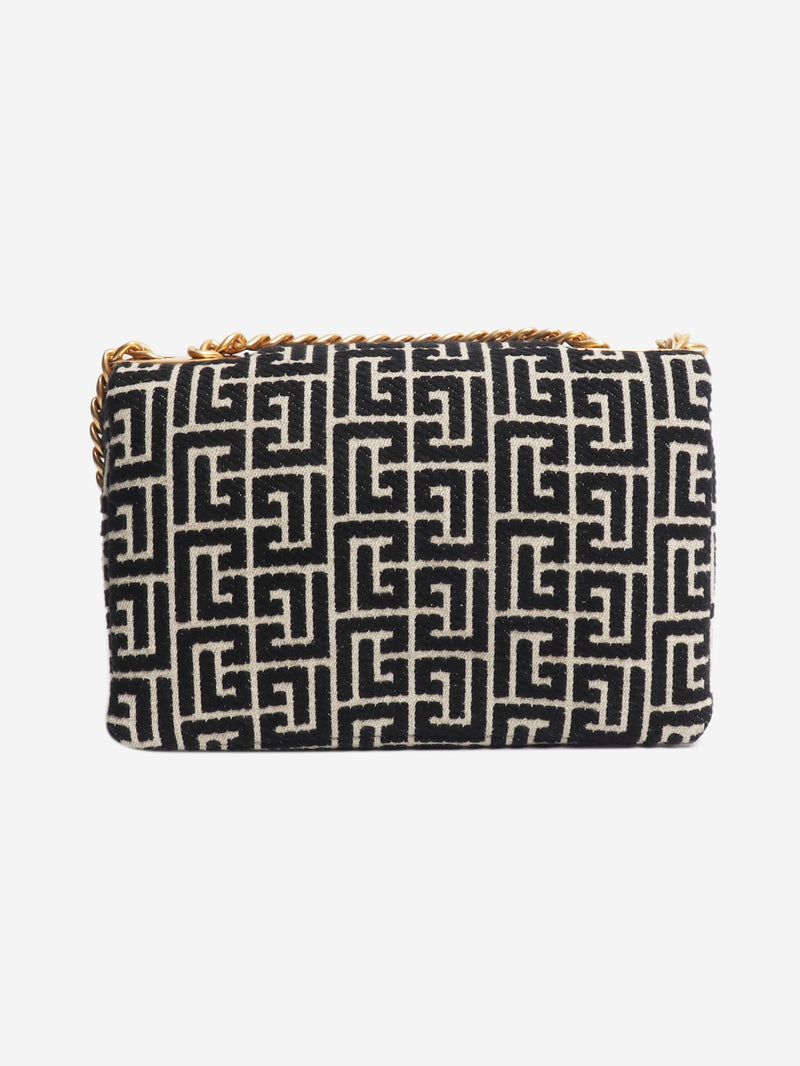 Black and neutral 1945 Soft Monogram Flap bag Shoulder bags Balmain 