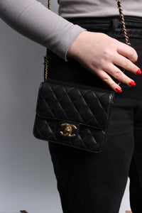 Chanel Black 2011 patent quilted mini single flap bag