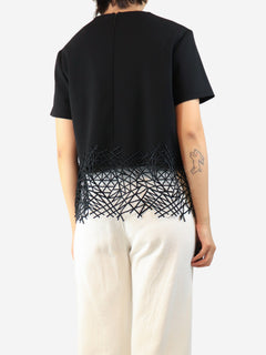 Black short-sleeved wool crepe top - size UK 12