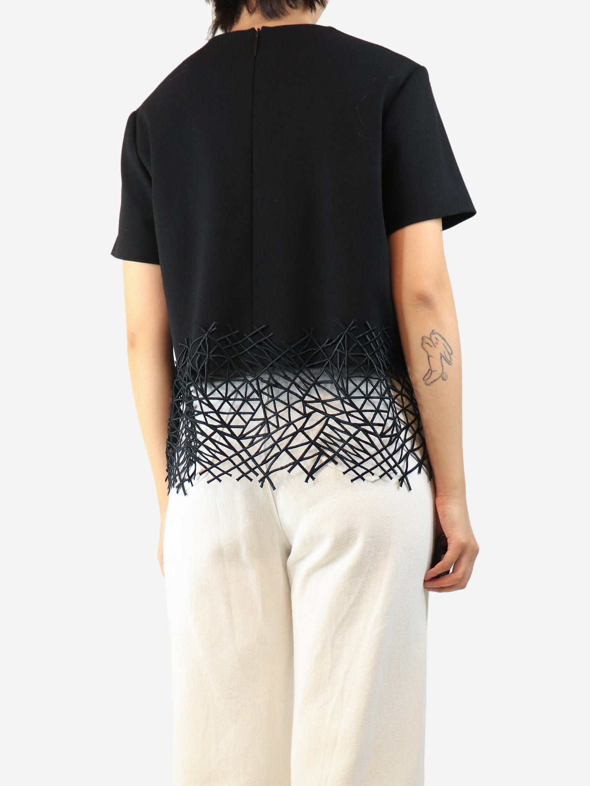 Black short-sleeved wool crepe top - size UK 12