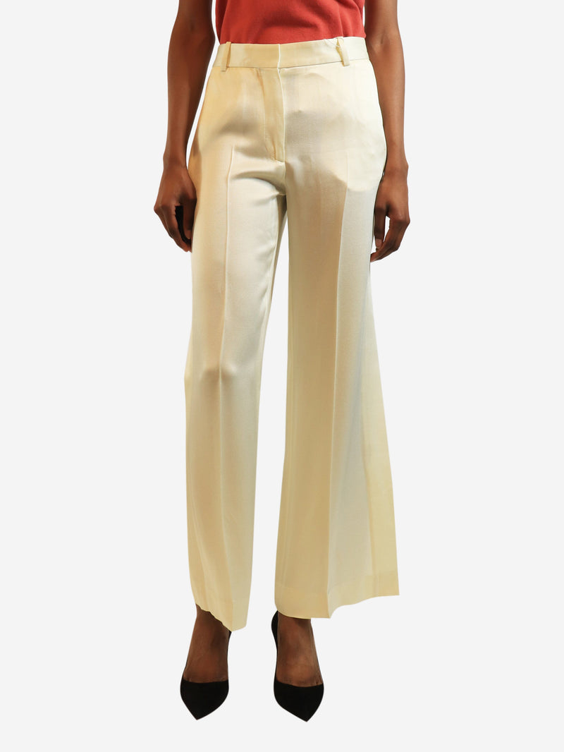 Cream cuff-slit trousers - size UK 4 Trousers Toteme 