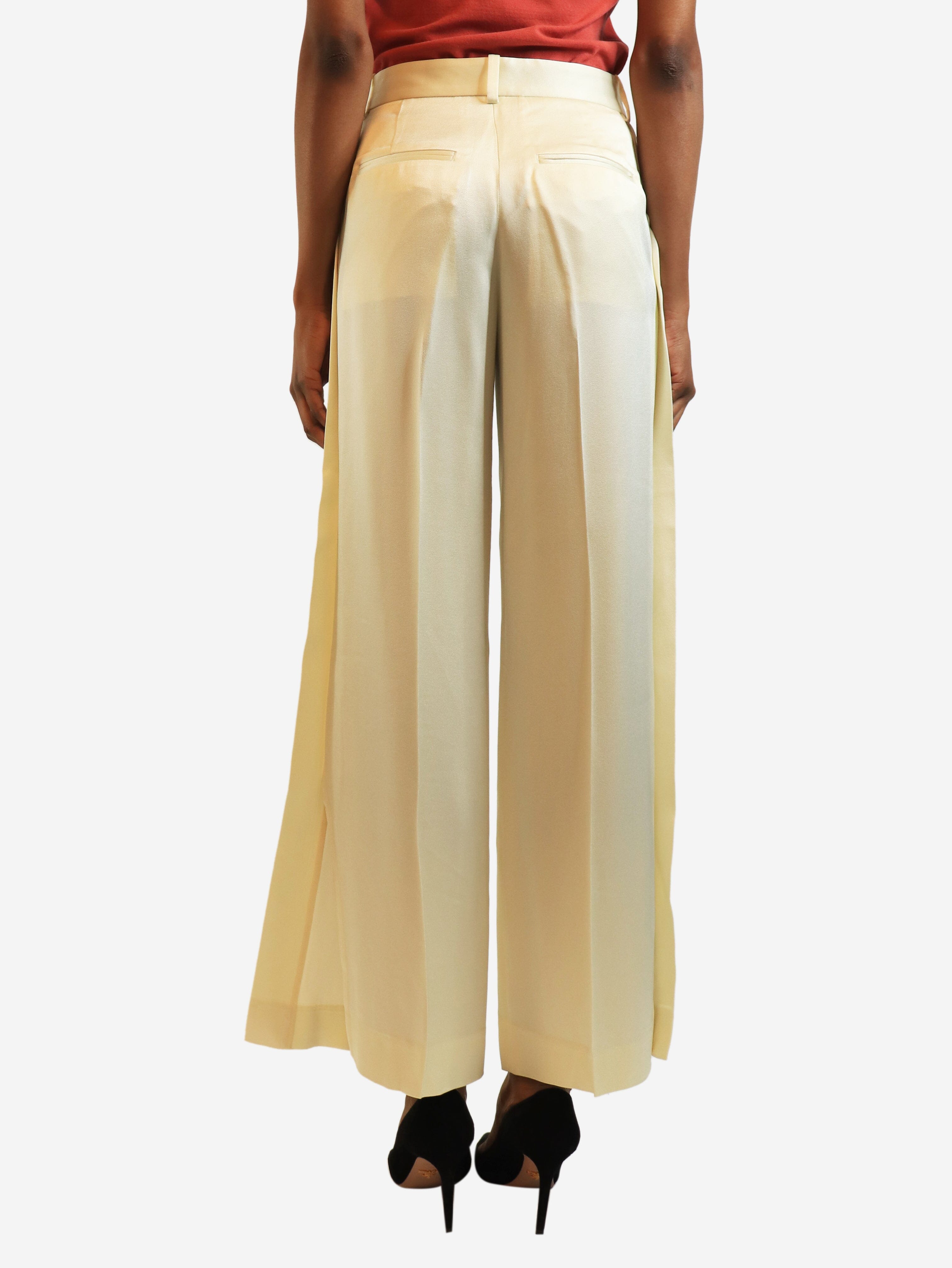 Cream cuff-slit trousers - size UK 4 Trousers Toteme 