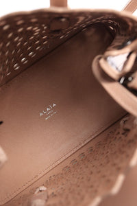 Alaia Neutral Le Mina laser-cut leather crossbody bag