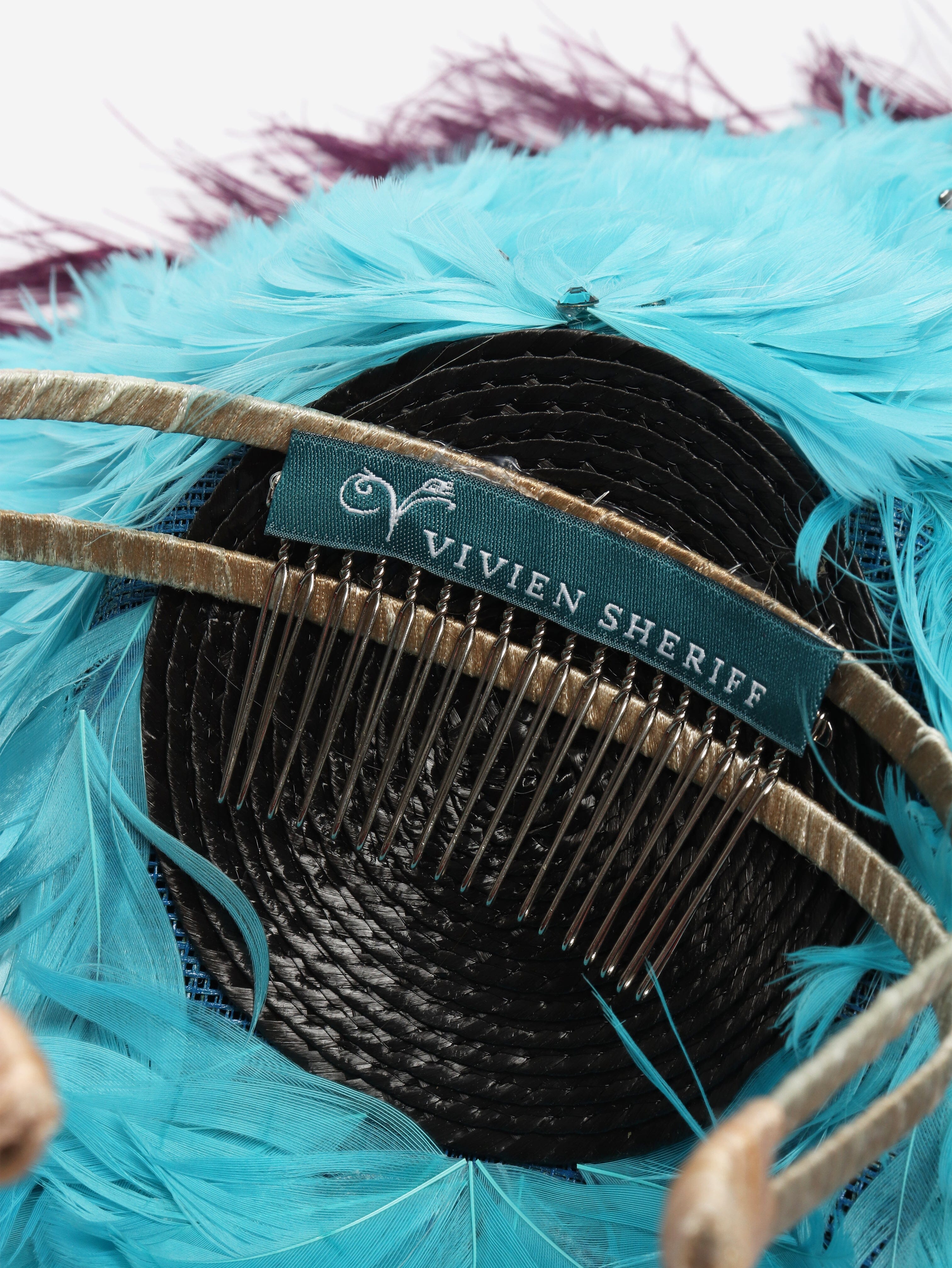 Purple Peacock feather fascinator Hats Vivien Sheriff 