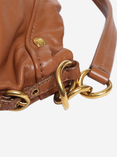 Brown leather hobo bag