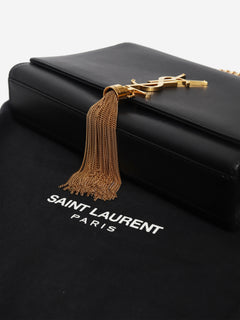 Kate black leather cross-body tassel bag