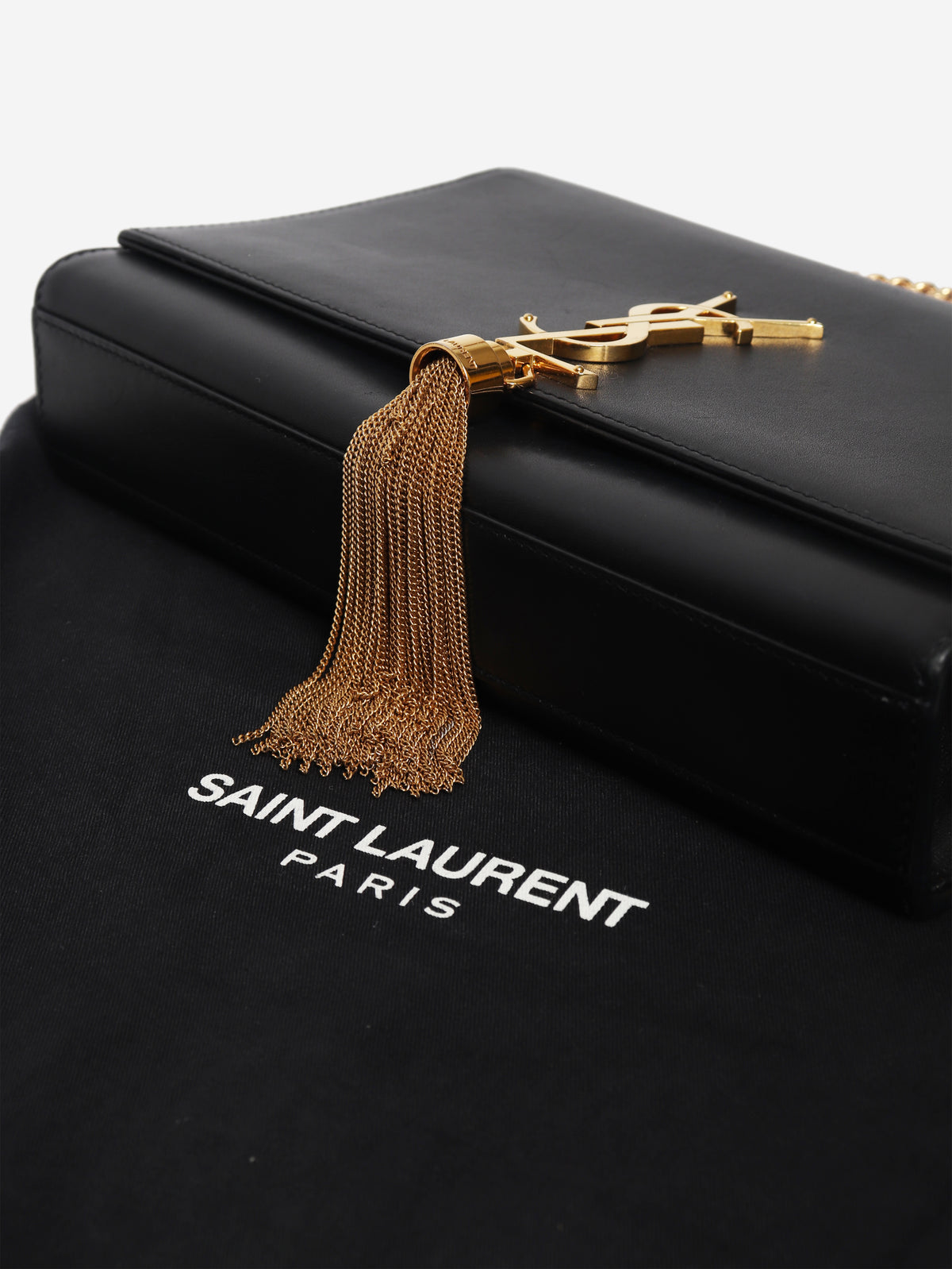 Kate black leather cross-body tassel bag