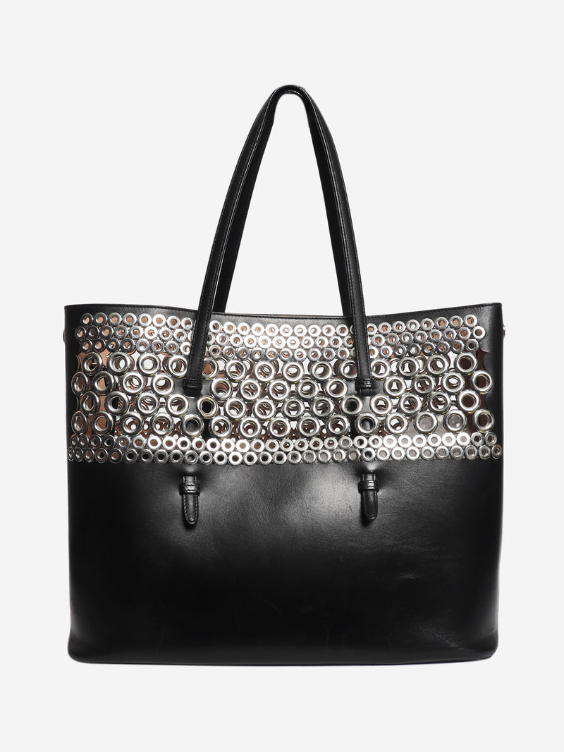 Black leather grommet tote bag