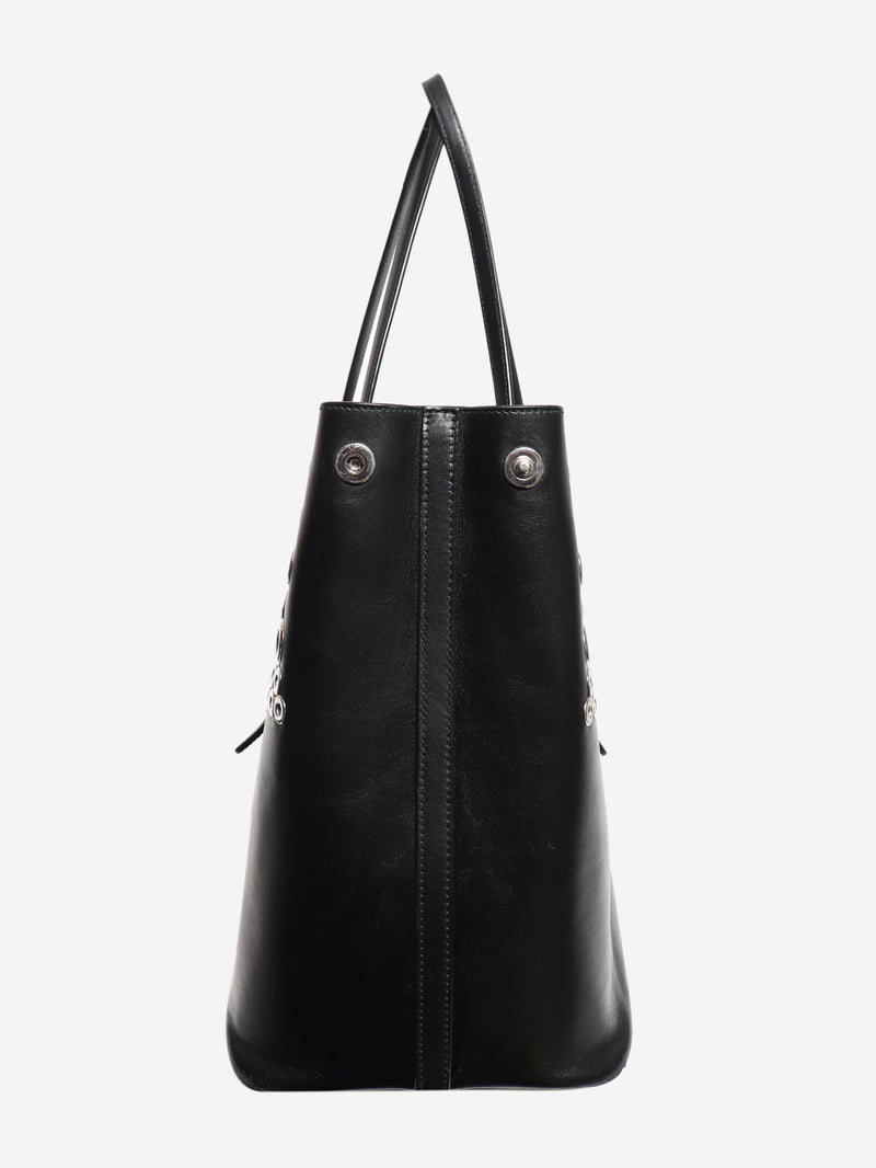Black leather grommet tote bag