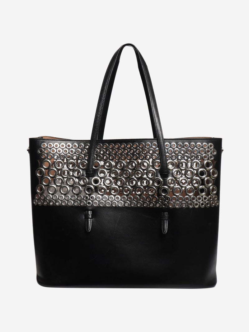 Black leather grommet tote bag