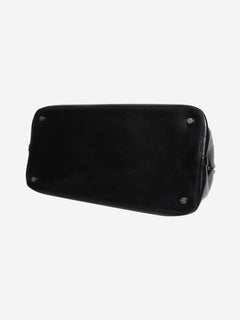 Black leather grommet tote bag