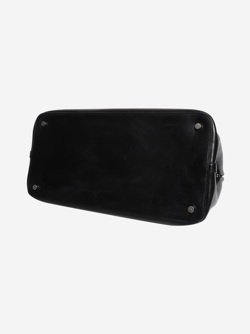 Black leather grommet tote bag