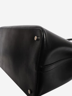 Black leather grommet tote bag
