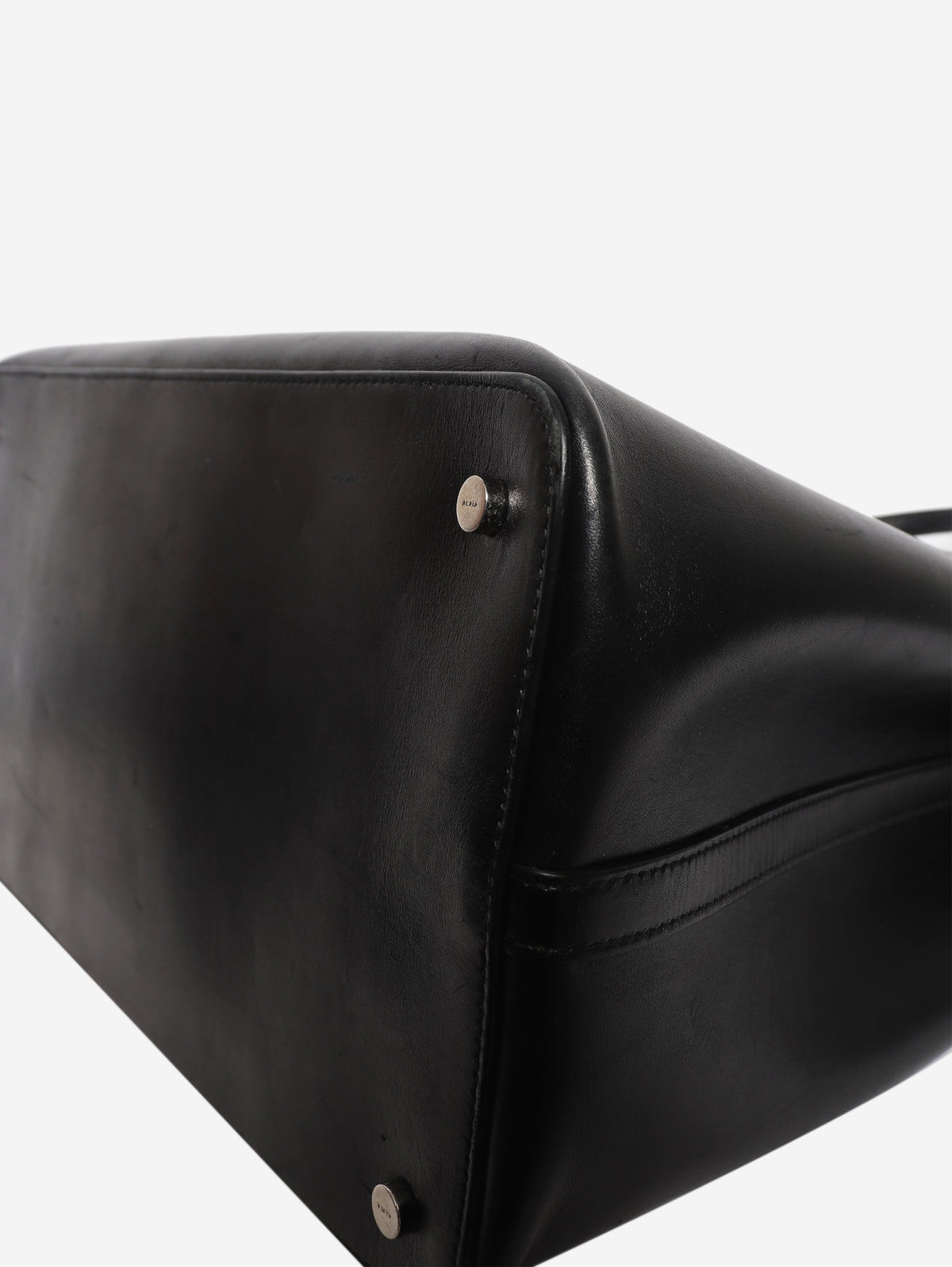 Black leather grommet tote bag