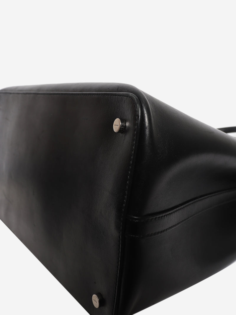 Black leather grommet tote bag