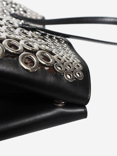 Black leather grommet tote bag