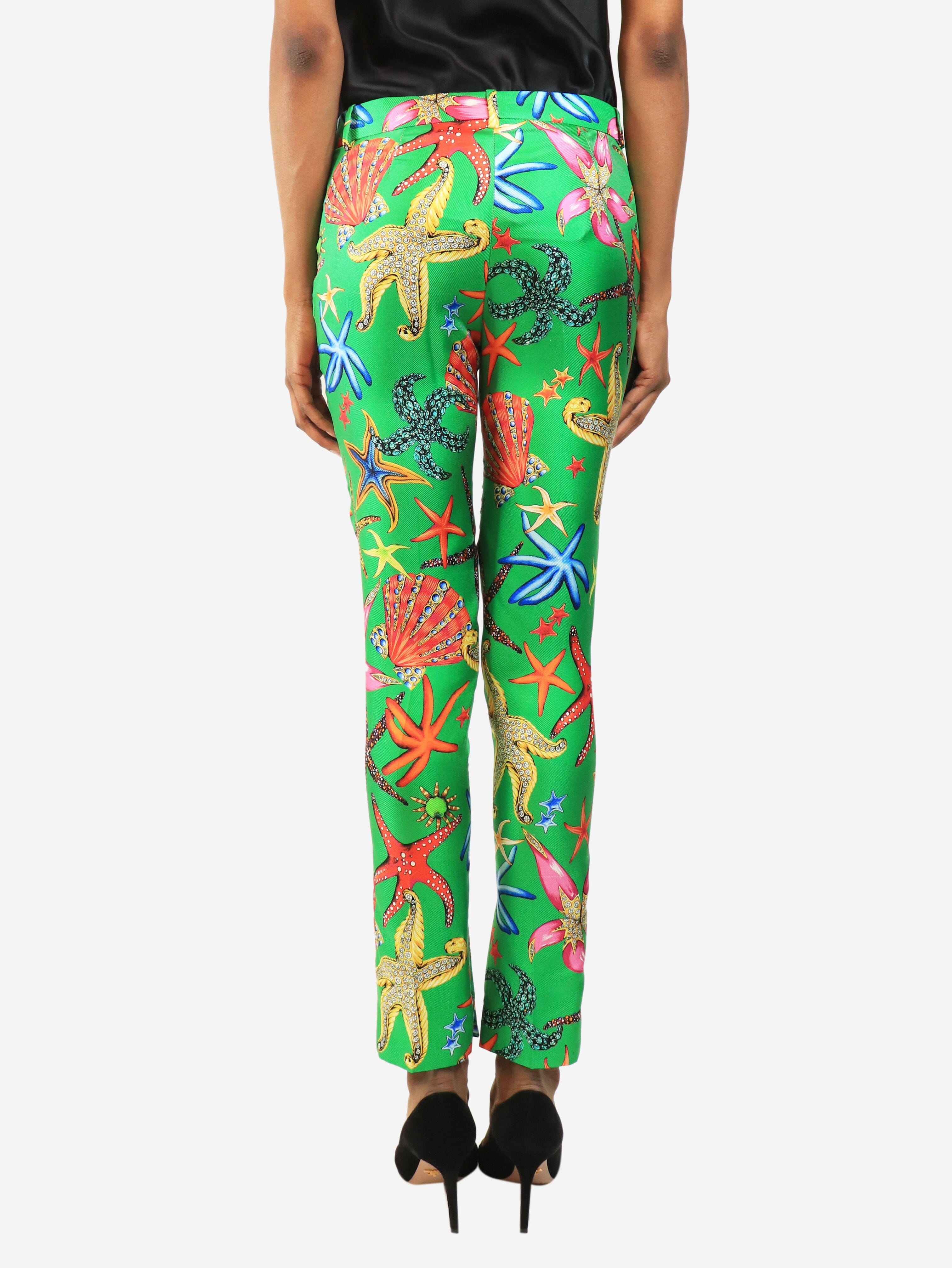 Green shell print trousers - size UK 4 Trousers Versace 