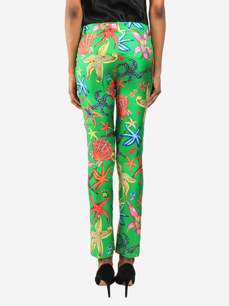 Green shell print trousers - size UK 4 Trousers Versace 