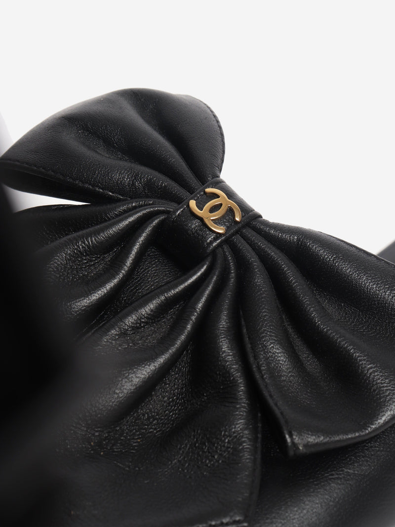 Black leather bow sandals - size EU 38 Flat Sandals Chanel 