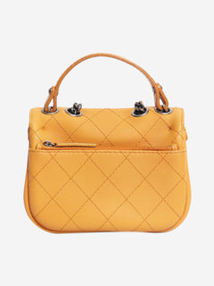 Orange 2014 diamond-quilted mini flap bag