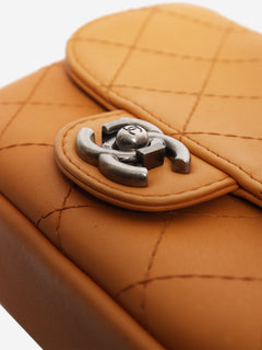 Orange 2014 diamond-quilted mini flap bag
