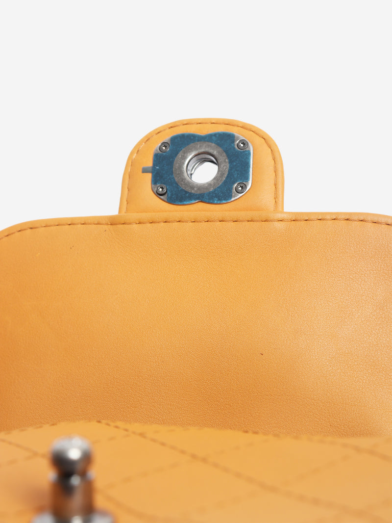 Orange 2014 diamond-quilted mini flap bag