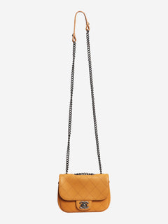 Orange 2014 diamond-quilted mini flap bag