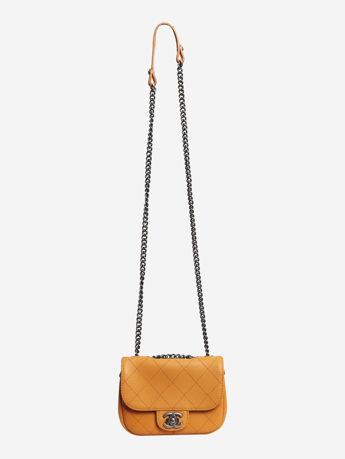 Orange 2014 diamond-quilted mini flap bag