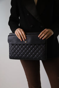 Chanel Black 2019 quilted caviar leather clutch bag