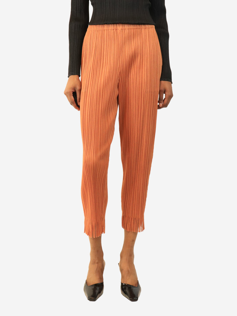 Burnt orange fringe-hem pleated trousers - size S