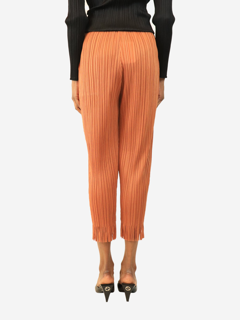 Burnt orange fringe-hem pleated trousers - size S