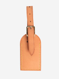 Louis Vuitton Neutral leather luggage tag
