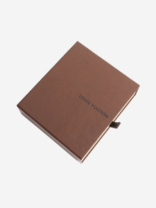 Louis Vuitton Neutral leather luggage tag
