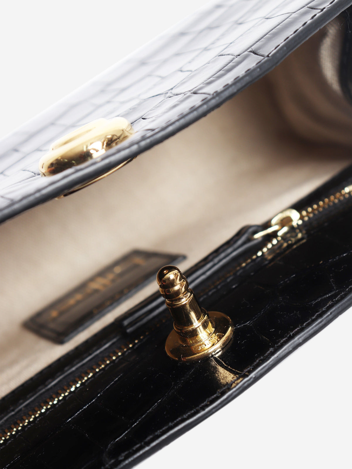 Black croc-embossed Pushlock clutch Clutch bags Liffner 