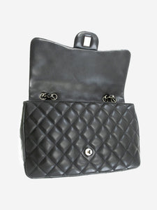 Chanel Black 2009 jumbo caviar Classic single flap bag