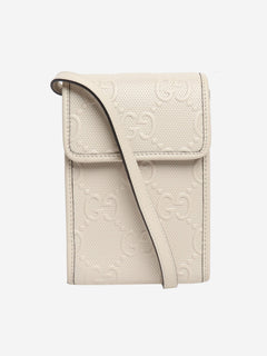 GG embossed leather mini flap crossbody bag Gucci 