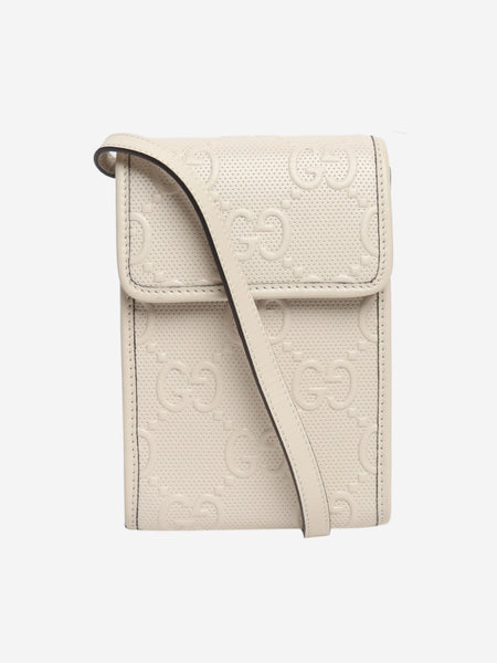 Cream GG embossed leather mini flap crossbody bag product image