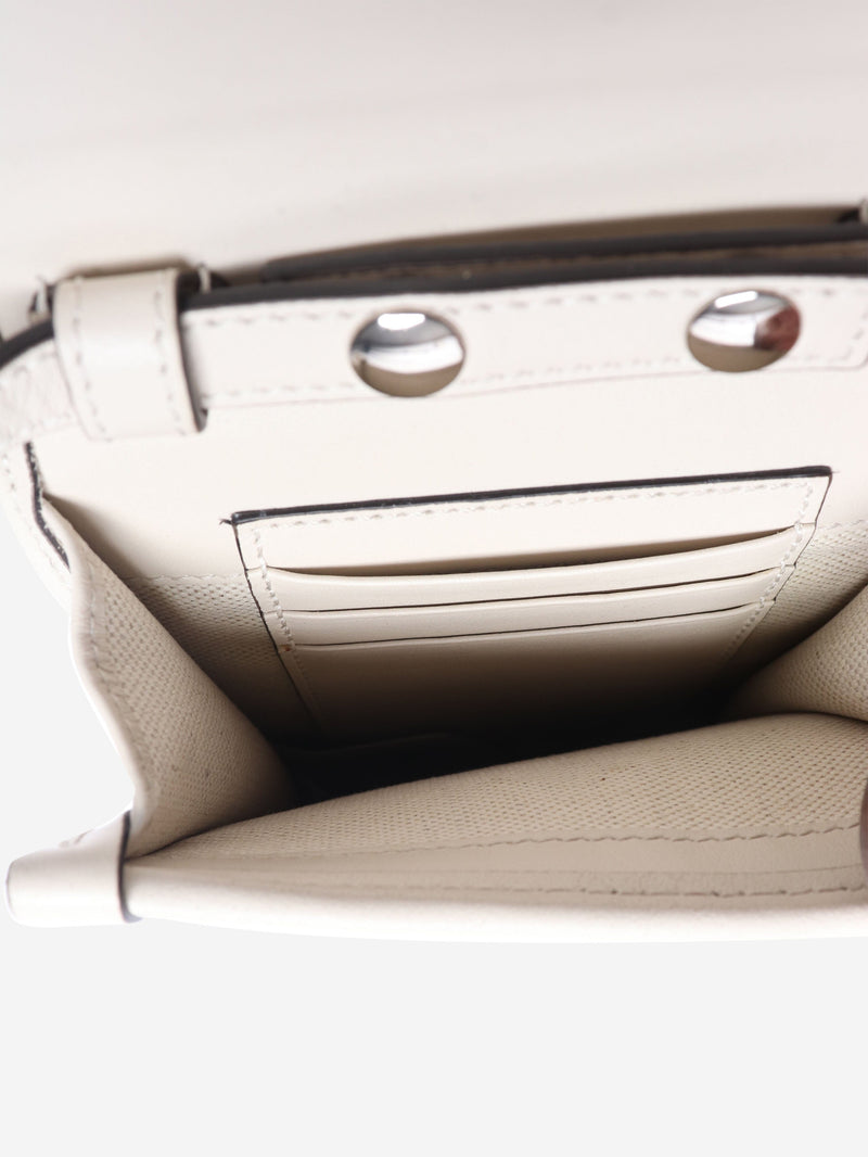 GG embossed leather mini flap crossbody bag Gucci 