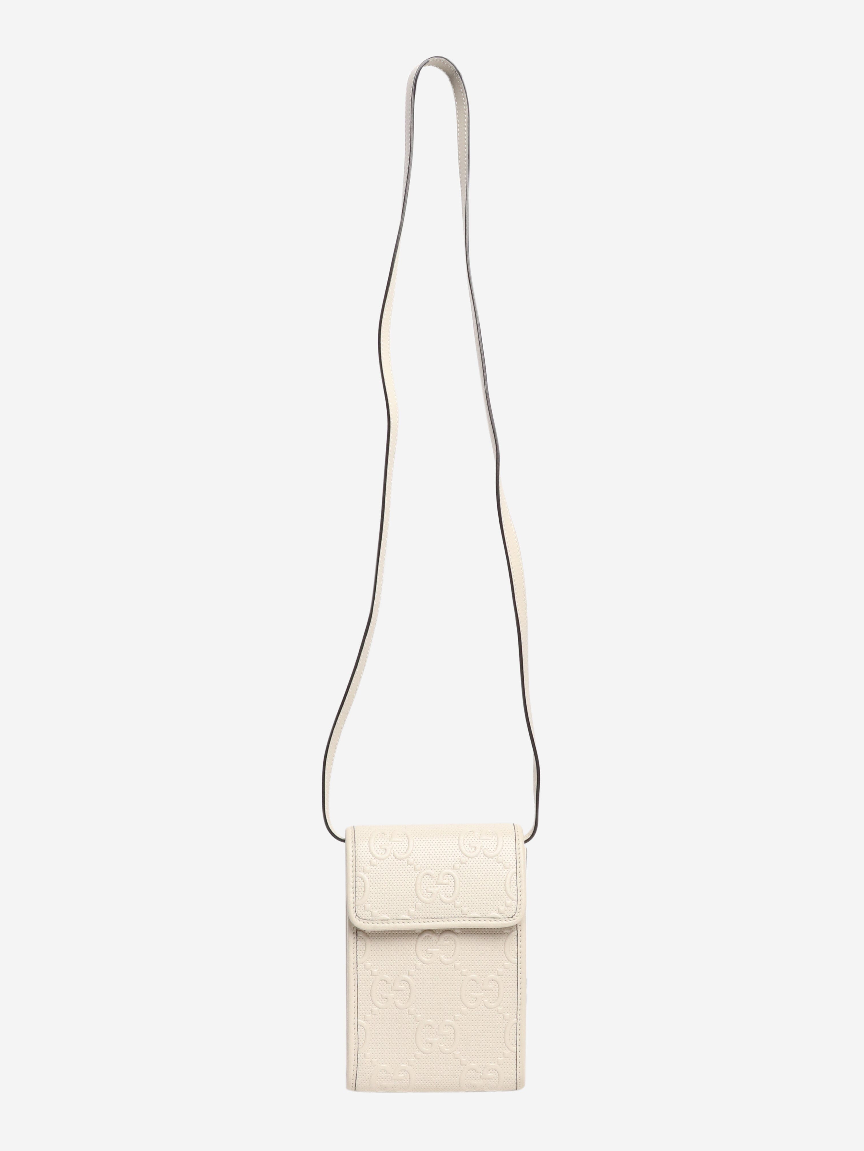 GG embossed leather mini flap crossbody bag Gucci 