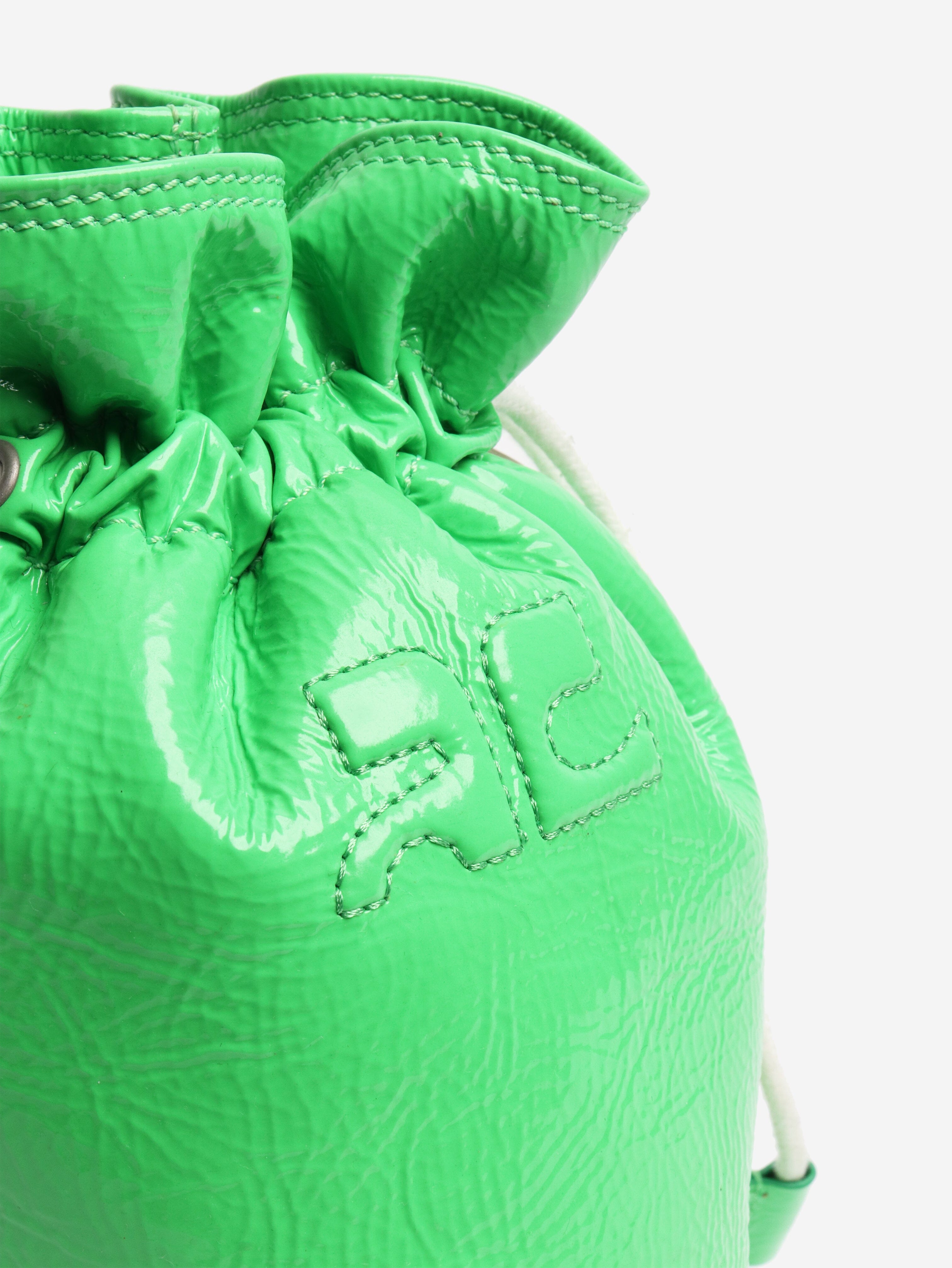 Acid green patent leather toggle bucket bag Cross-body Bags Courreges 