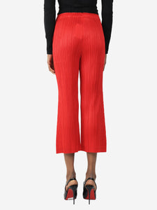Pleats Please Red pleated trousers - size XS