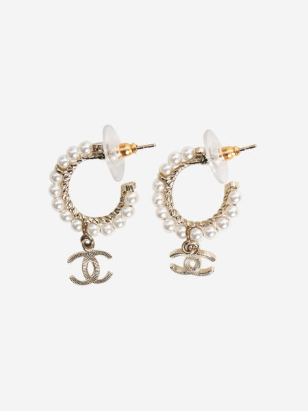 Gold pearl sleeper earrings product image