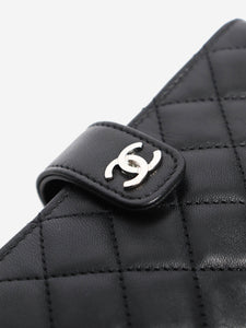 Chanel Black 2014 lambskin quilted O-Mini clutch